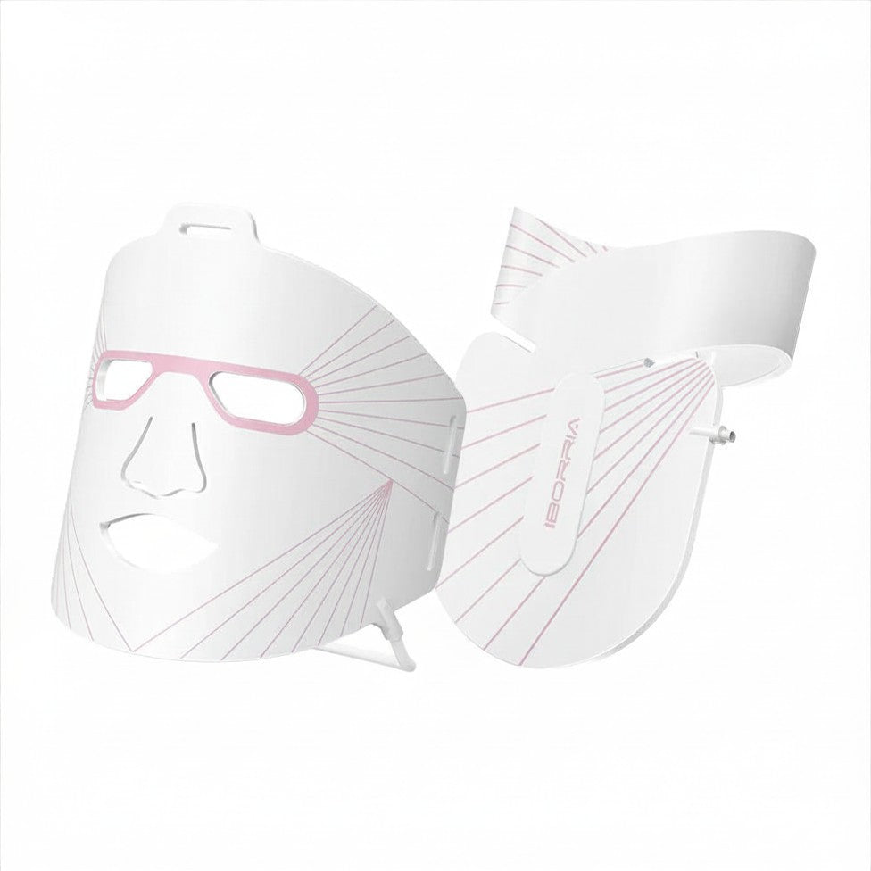 White paper masks with pink accents on a white background